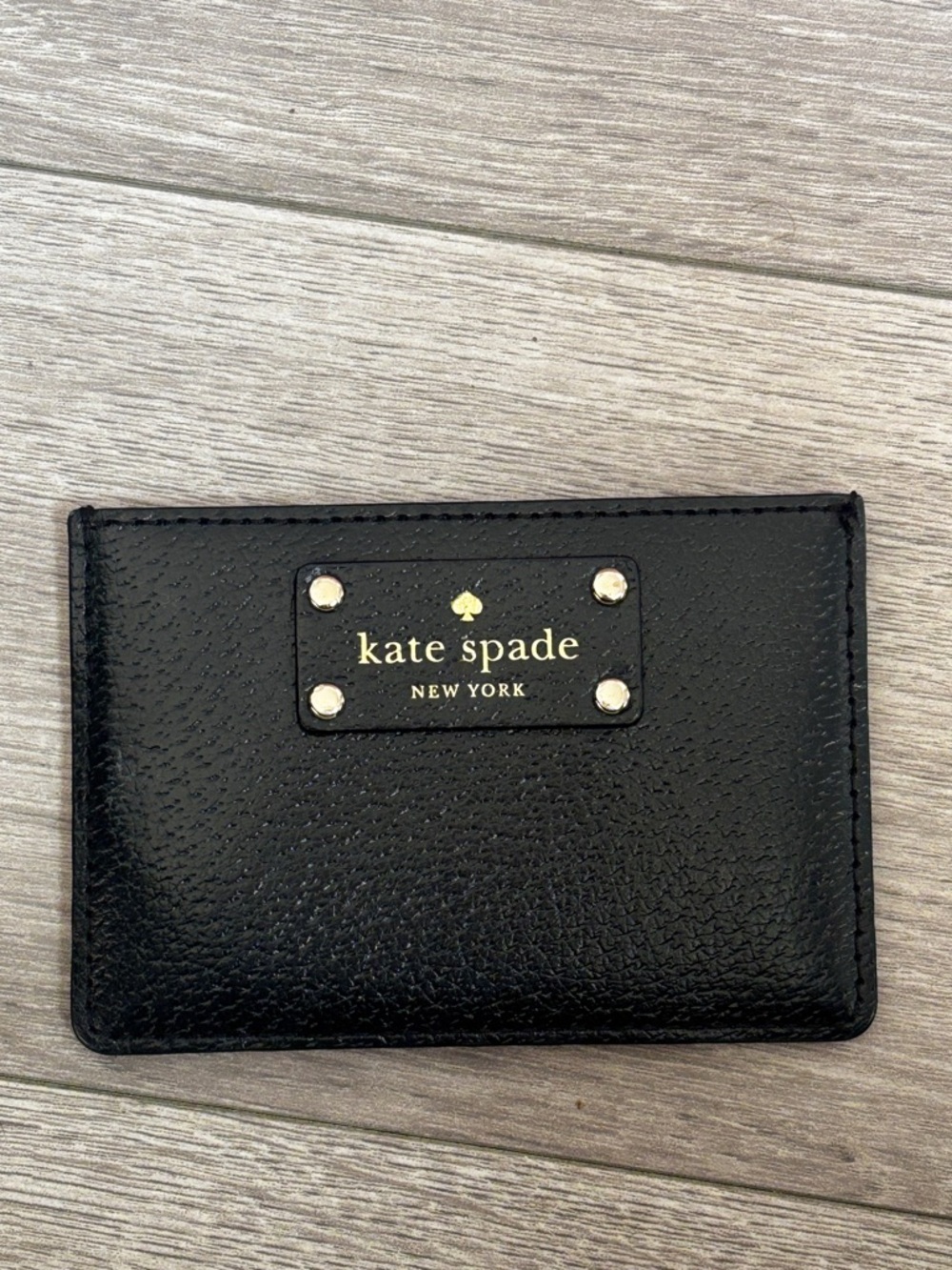 kate spade Black Leather Card Sleeve with Gold Logo Plate